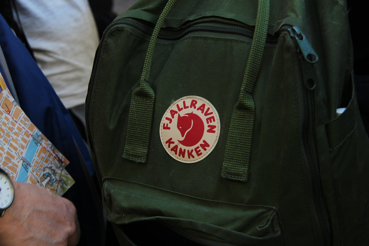 green and red Fjallraven Kanken bag