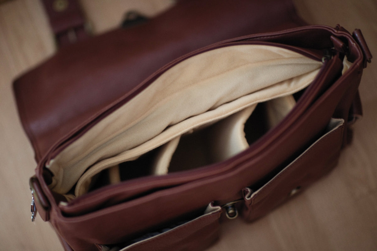 a brown bag is open on the floor